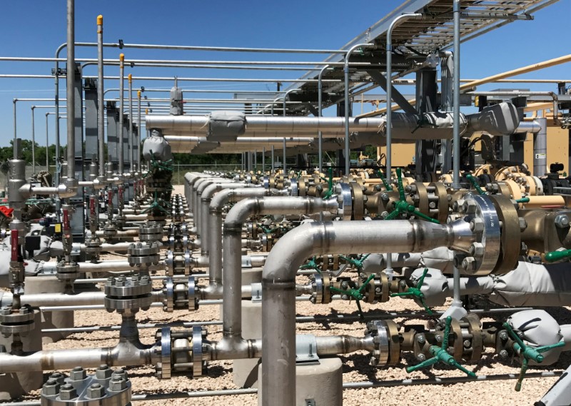 FILE PHOTO: Equipment used to process carbon dioxide, crude oil and water is seen at an Occidental Petroleum Corp enhanced oil recovery project in Hobbs, New Mexico, U.S. on May 3, 2017. Picture taken on May 3, 2017.   REUTERS/Ernest Scheyder/File Photo