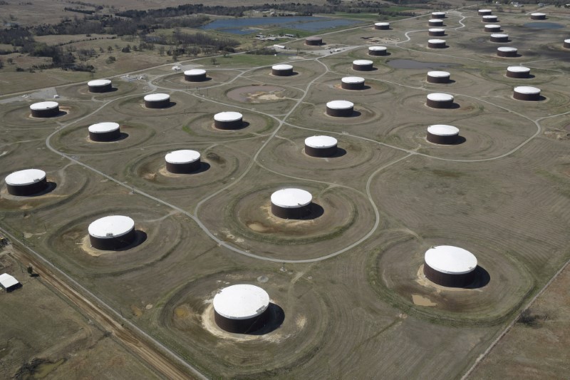 FILE PHOTO: Crude oil storage tanks are seen from above at the Cushing oil hub, in Cushing, Oklahoma, March 24, 2016. REUTERS/Nick Oxford/File Photo